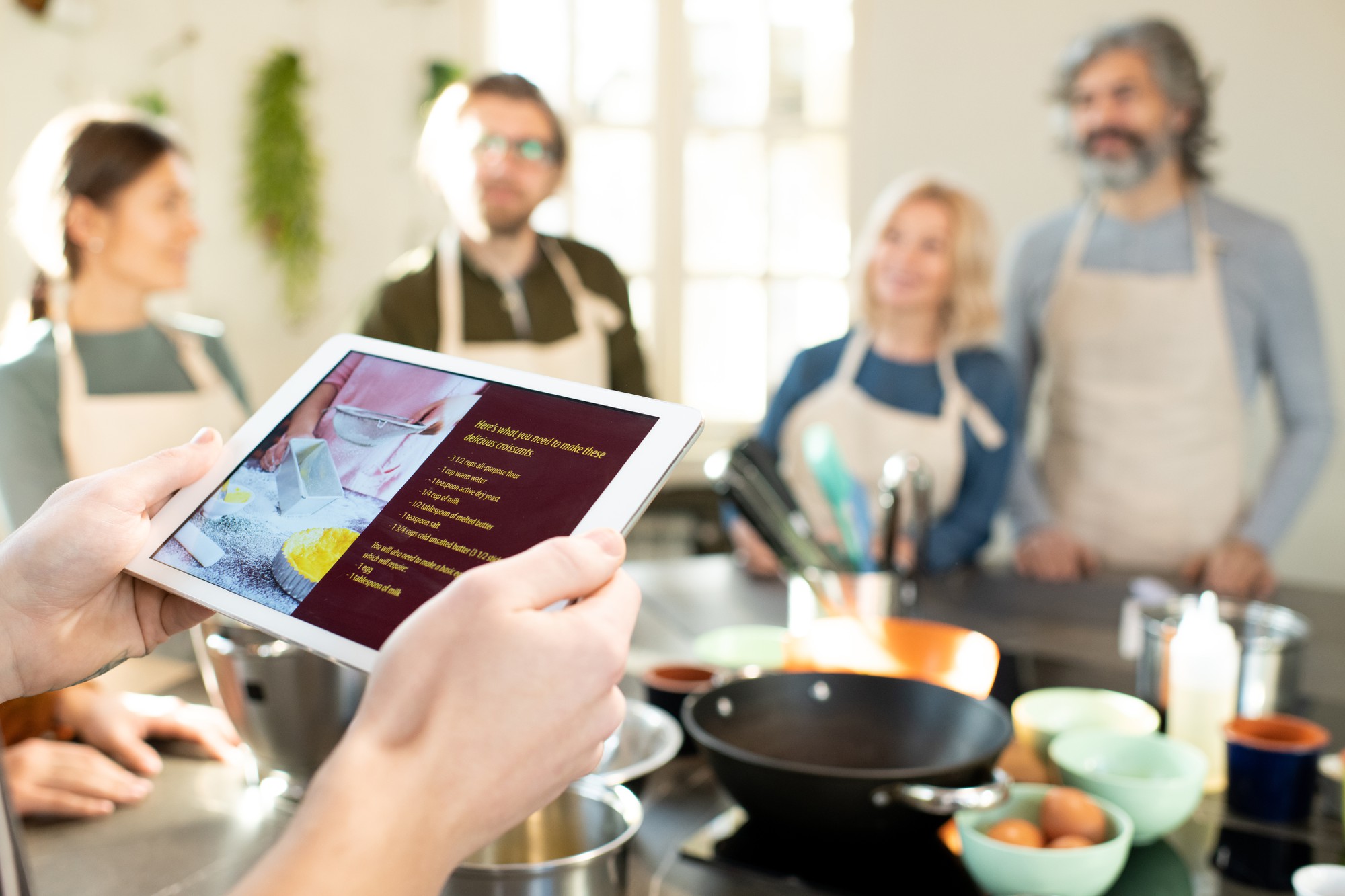 Consultation meeting with cookbook and tablet